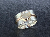 The Stardust Glint - A Handcrafted Sterling Silver & 9ct Gold Bandeau Ring with White Moonstone